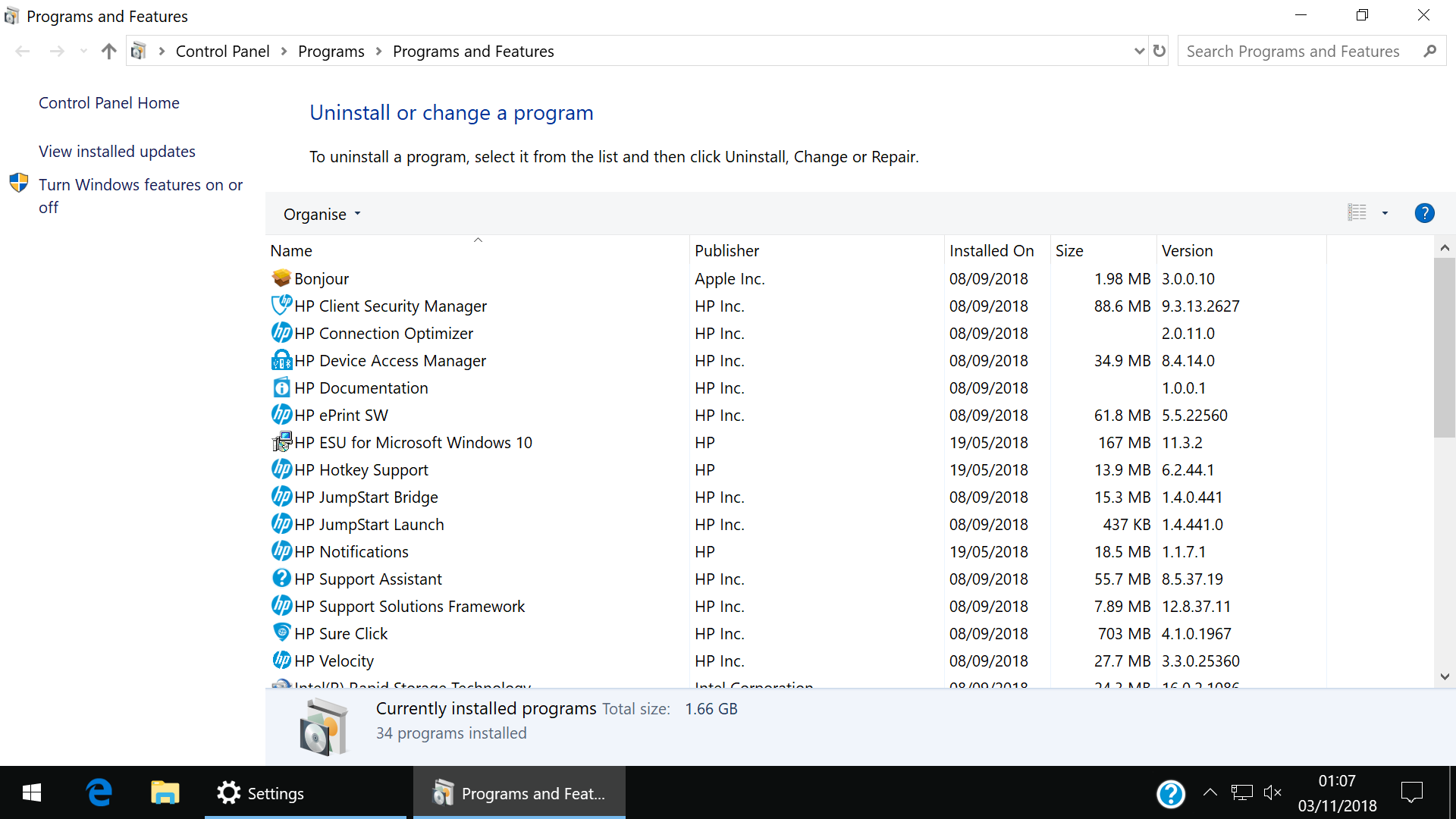 A screenshot of the Control Panel 'Uninstall or change a program' menu showing a large number of pre-installed HP programs.